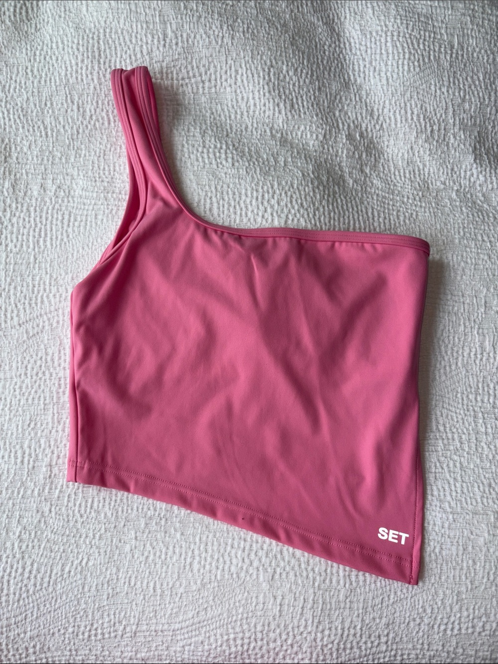 Set active one-shoulder pink top